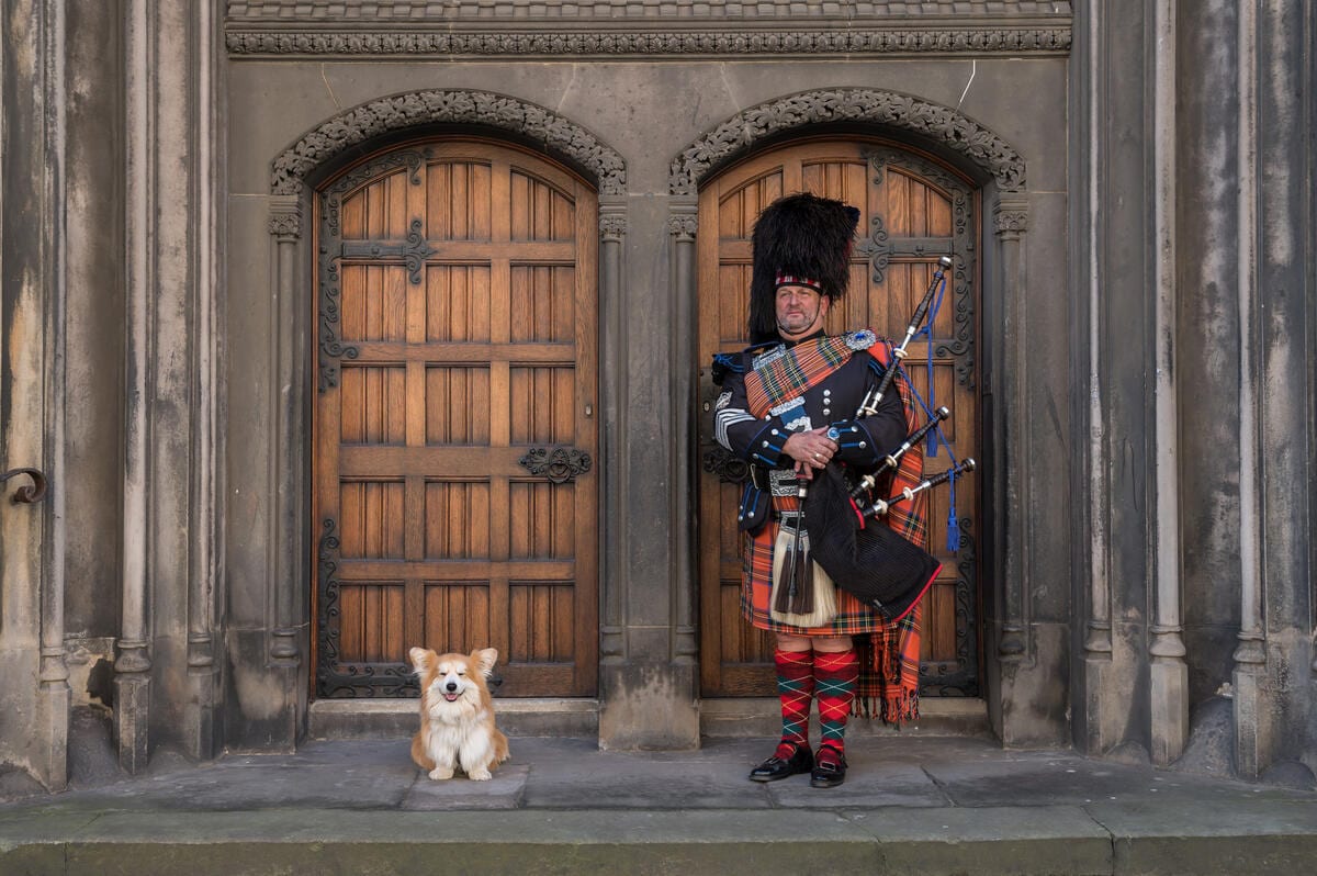 A piper at the cathedral doors